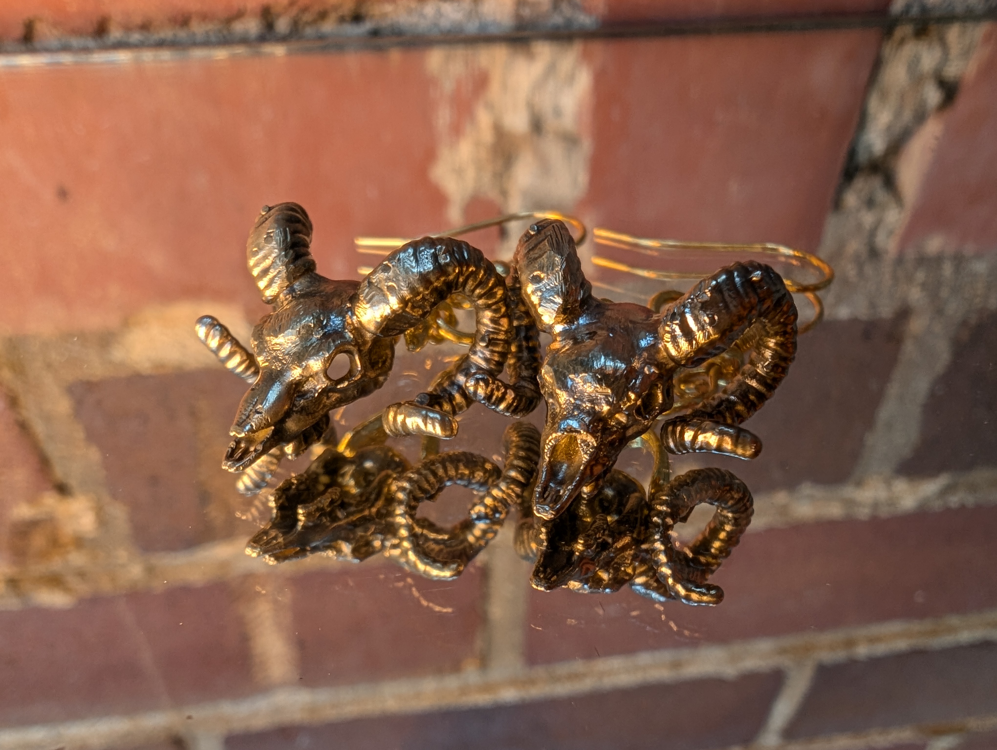 Brass Ram Skulls with a dangle setting